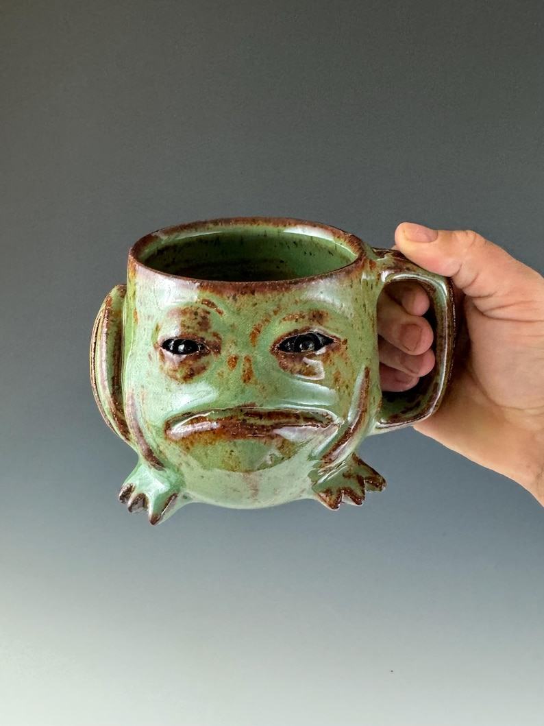 Handmade Masterpiece Elevate Your Daily Brew with Our Unique Pottery Mug