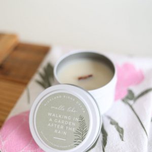 Immerse Yourself in Nature’s Embrace Walking In A Garden After The Rain Candle Tin
