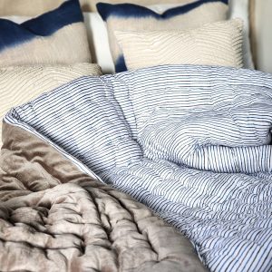 Indulge in Tranquil Slumber Cozy Haven’s Velvet Quilt, Voile Runner, and Soft Throw