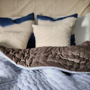 Indulge in Tranquil Slumber Cozy Haven’s Velvet Quilt, Voile Runner, and Soft Throw
