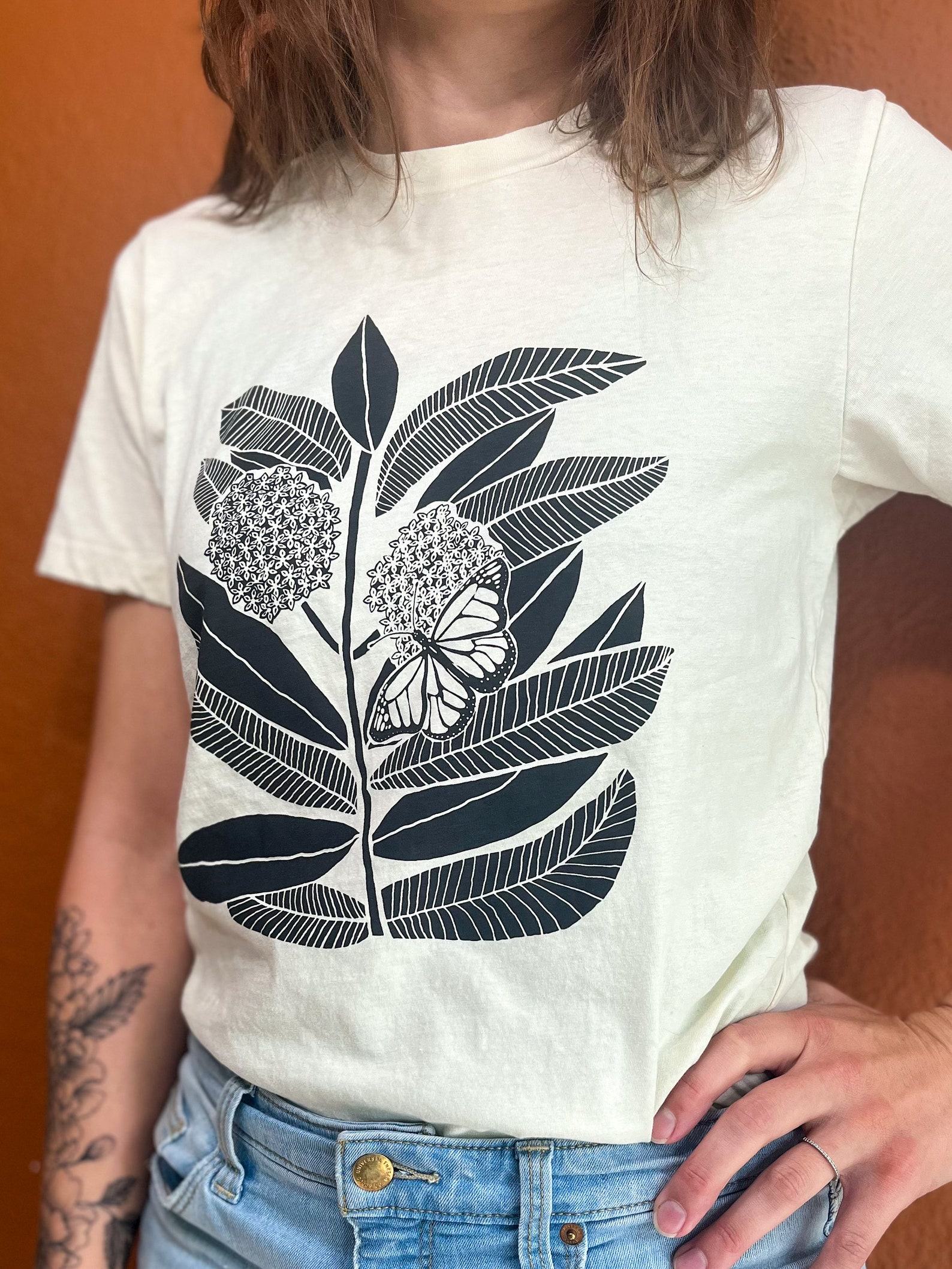 Monarch Butterfly and Milkweed A Symbiotic Symphony on a Handcrafted Tee - Image 6