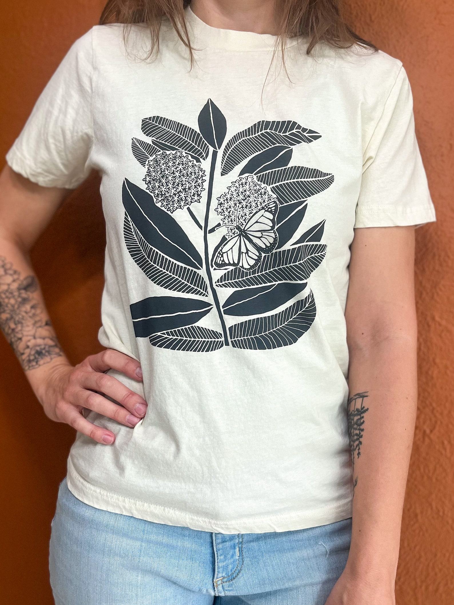 Monarch Butterfly and Milkweed A Symbiotic Symphony on a Handcrafted Tee - Image 5