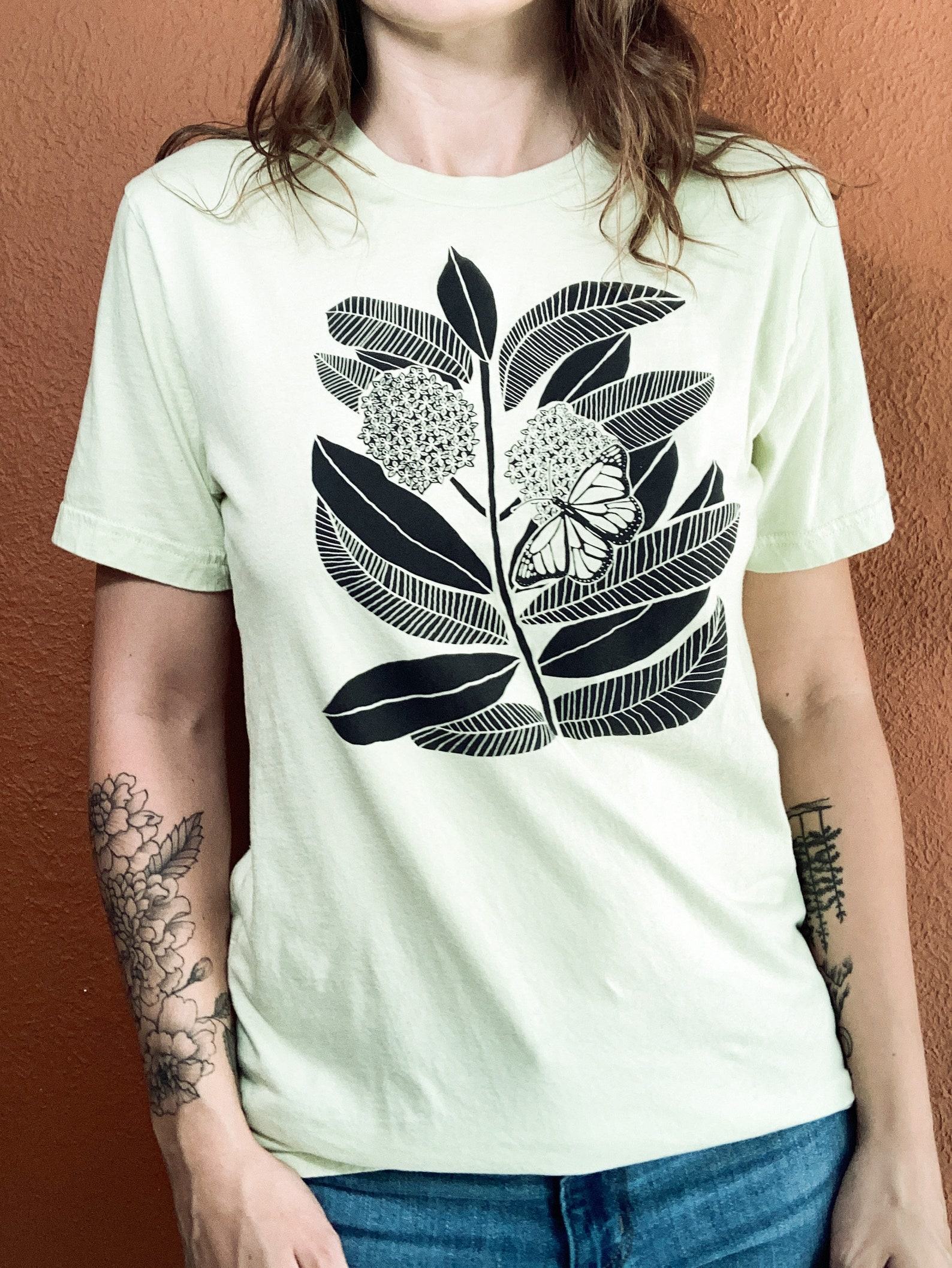 Monarch Butterfly and Milkweed A Symbiotic Symphony on a Handcrafted Tee - Image 4