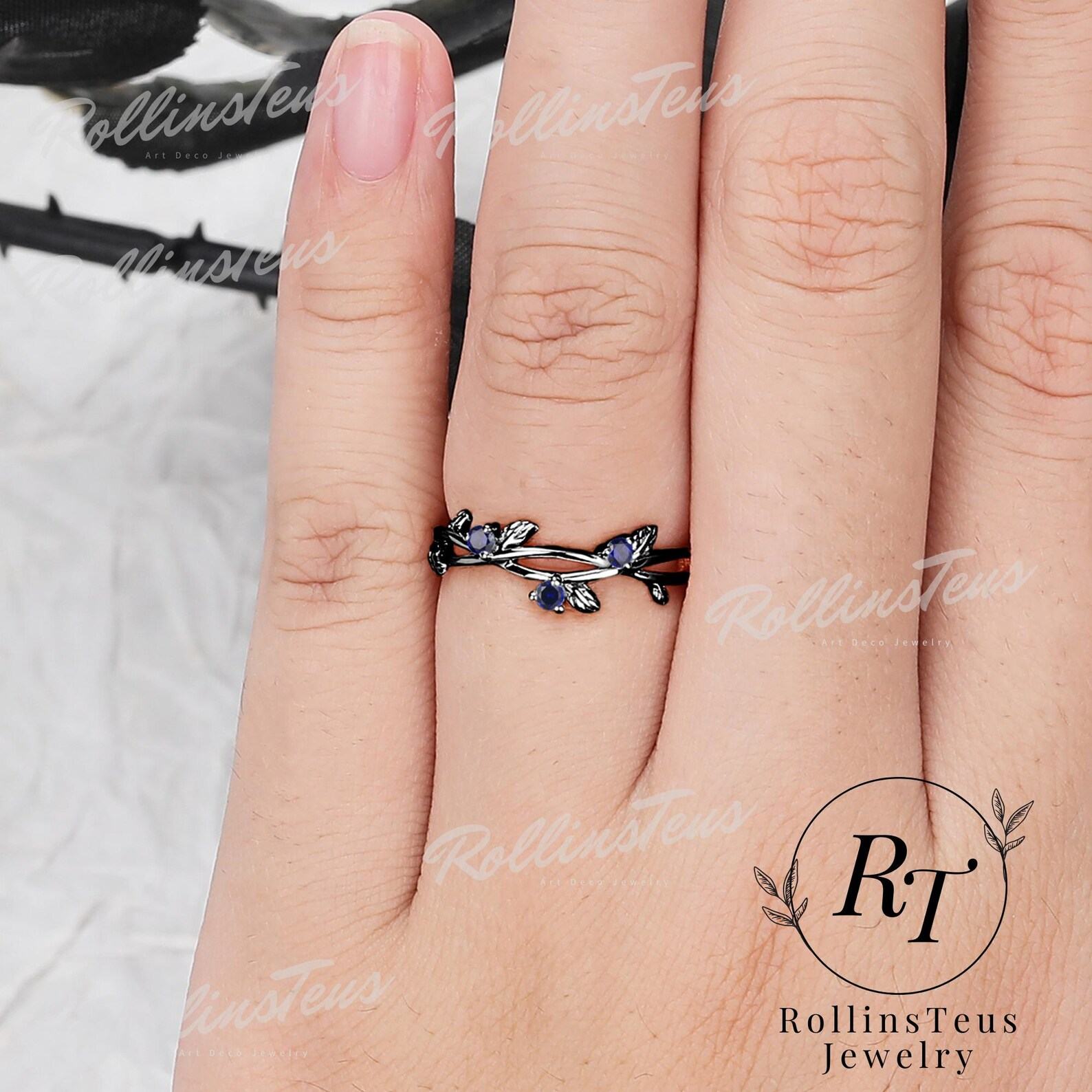 Nature’s Embrace Blue Sapphire and Black Gold Twig Ring, a Symbol of Love and Growth