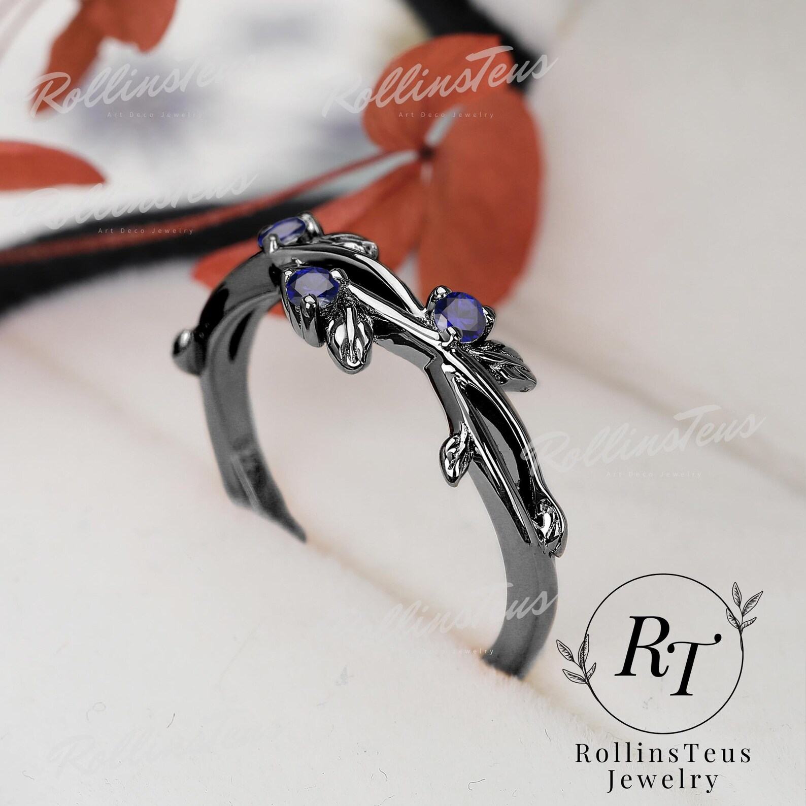 Nature’s Embrace Blue Sapphire and Black Gold Twig Ring, a Symbol of Love and Growth