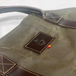 Oilskin and Leather LOG CARRIER The Ultimate Firewood Carrier for Bushcraft and Outdoor Enthusiasts