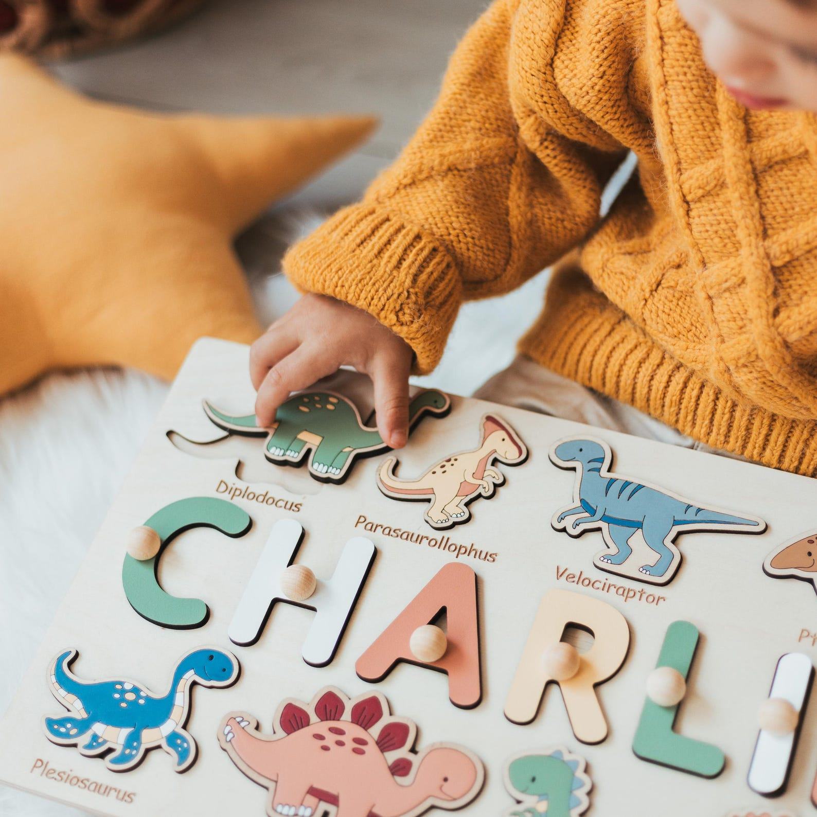 Personalized Dinosaur Busy Board – Montessori Dino Puzzle Toy for Toddlers – Custom Name Present & Nursery Decor