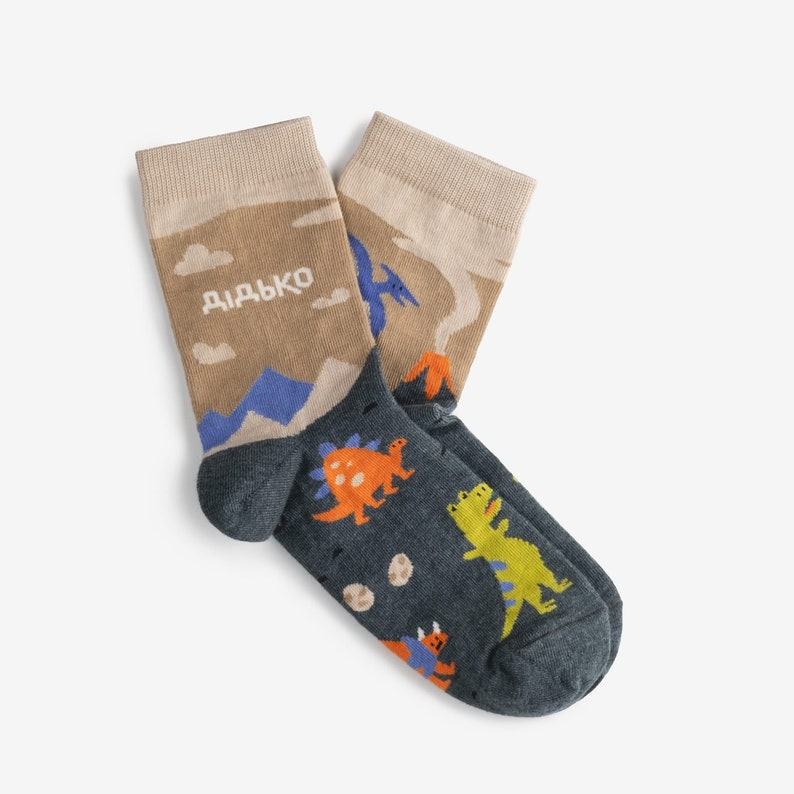 Roar-some Dinosaur Socks Stomp into Style with Dammit Socks