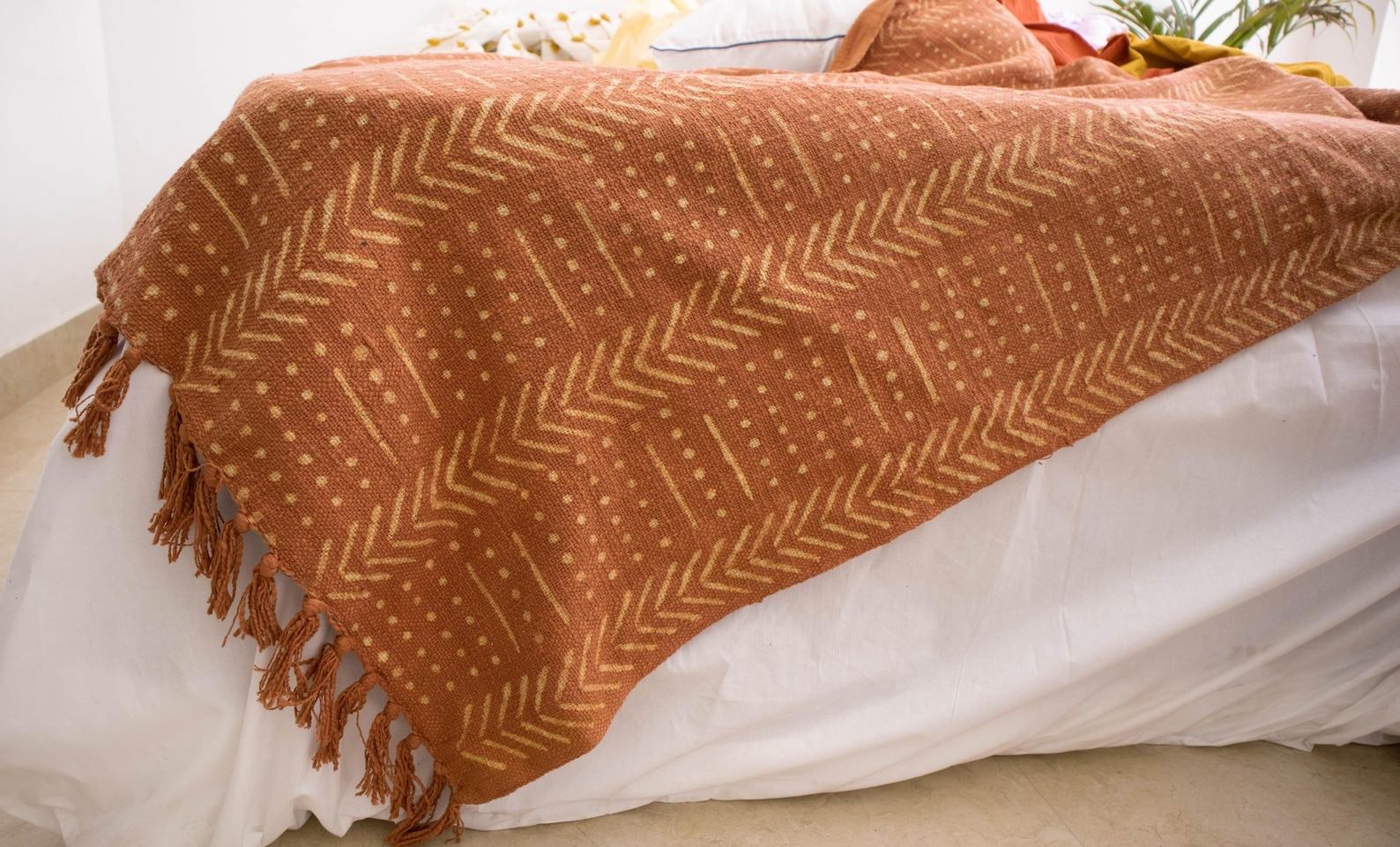 Rustic Charm Handcrafted Mud Cloth Cotton Blanket with Intricate Block Prints, Fringes, and Tassels - Image 4