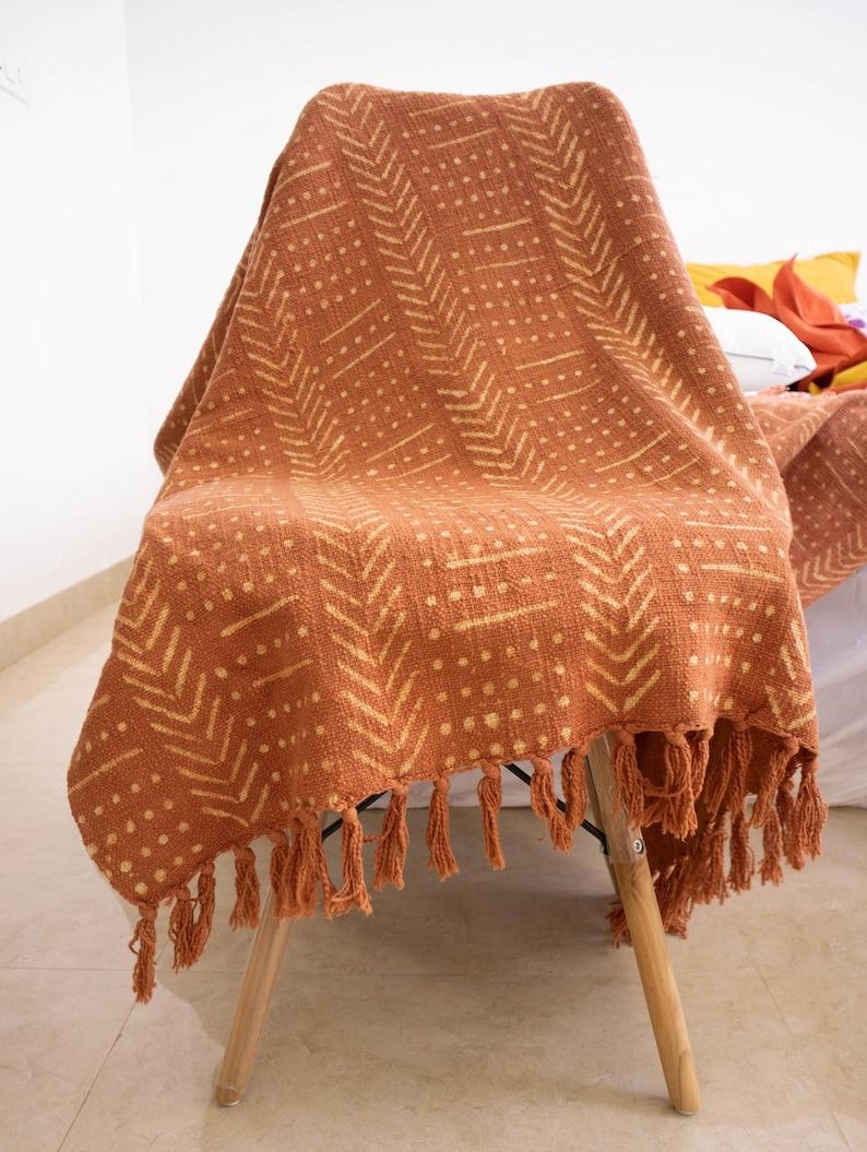 Rustic Charm Handcrafted Mud Cloth Cotton Blanket with Intricate Block Prints, Fringes, and Tassels