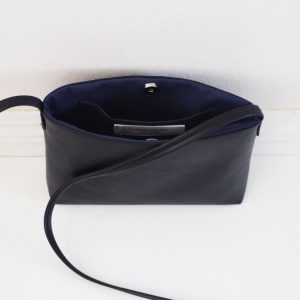 Sleek and Sophisticated The Minimalist Black Leather Crossbody Bag with Magnetic Closure