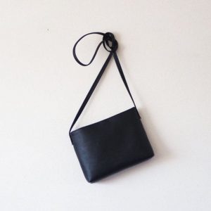 Sleek and Sophisticated The Minimalist Black Leather Crossbody Bag with Magnetic Closure