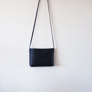 Sleek and Sophisticated The Minimalist Black Leather Crossbody Bag with Magnetic Closure