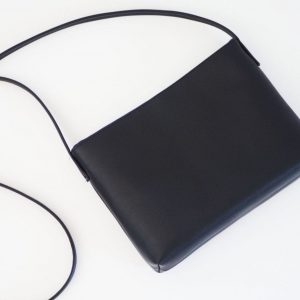 Sleek and Sophisticated The Minimalist Black Leather Crossbody Bag with Magnetic Closure