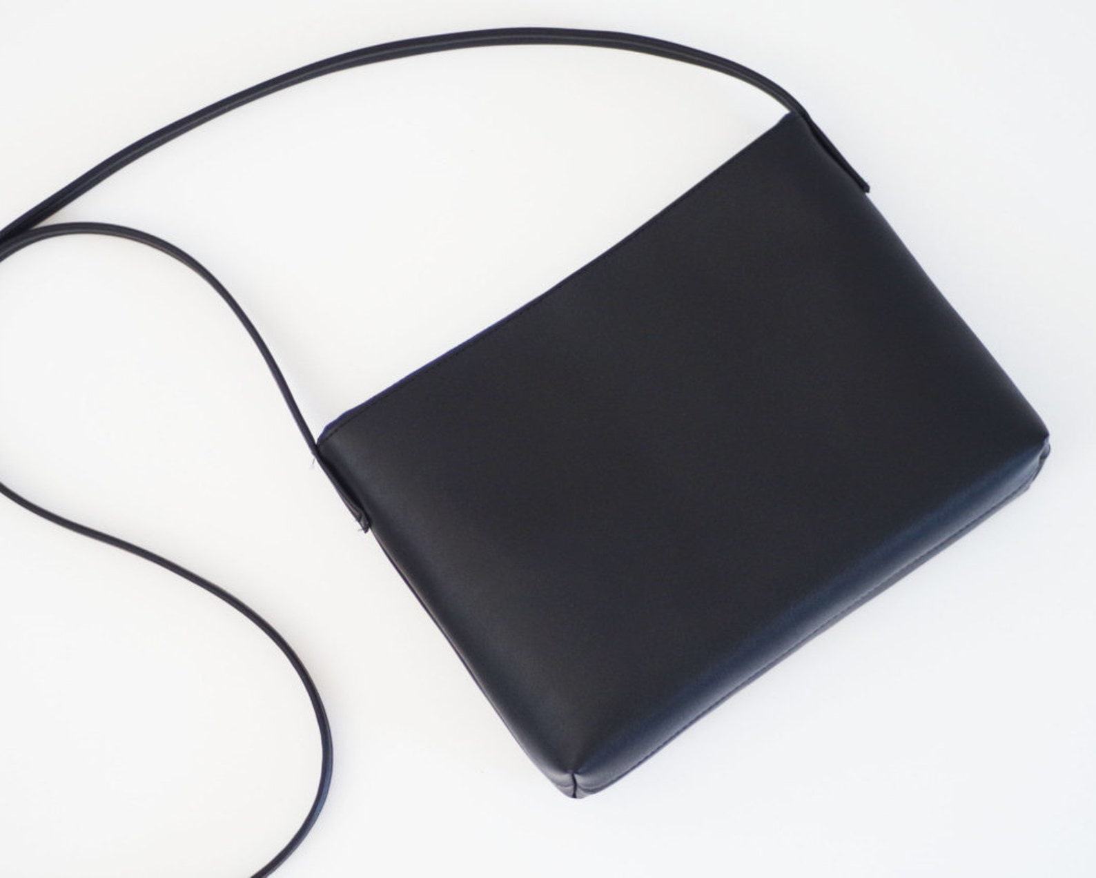 Sleek and Sophisticated The Minimalist Black Leather Crossbody Bag with Magnetic Closure - Image 3