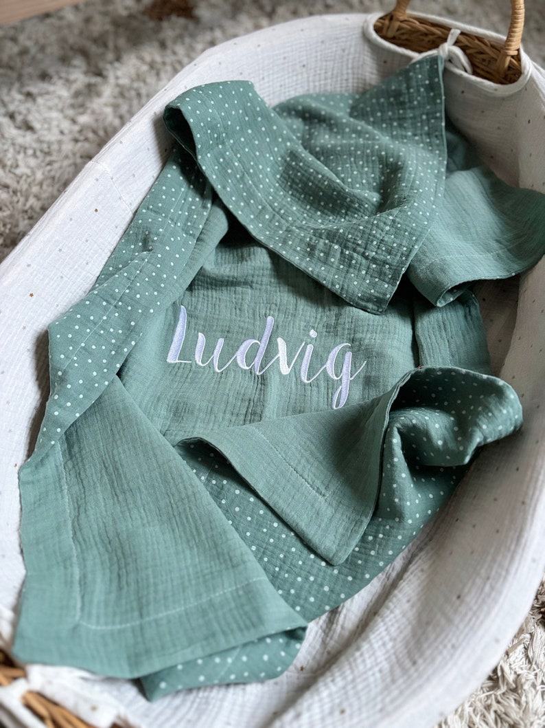 Snuggle Up in Comfort Personalized Muslin Baby Blanket for Sweet Dreams and Stylish Swaddles
