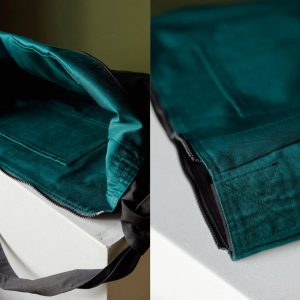 Spacious Black Hobo Bag with Green Lining and Adjustable Strap