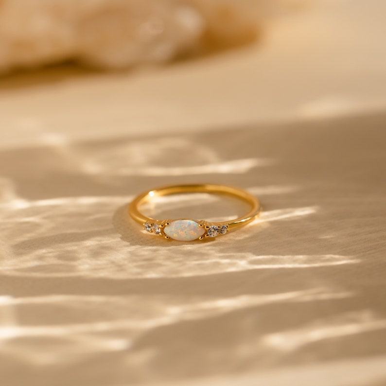 Sparkling Elegance Caitlyn’s Opal and Diamond Ring – A Timeless Symbol of Love