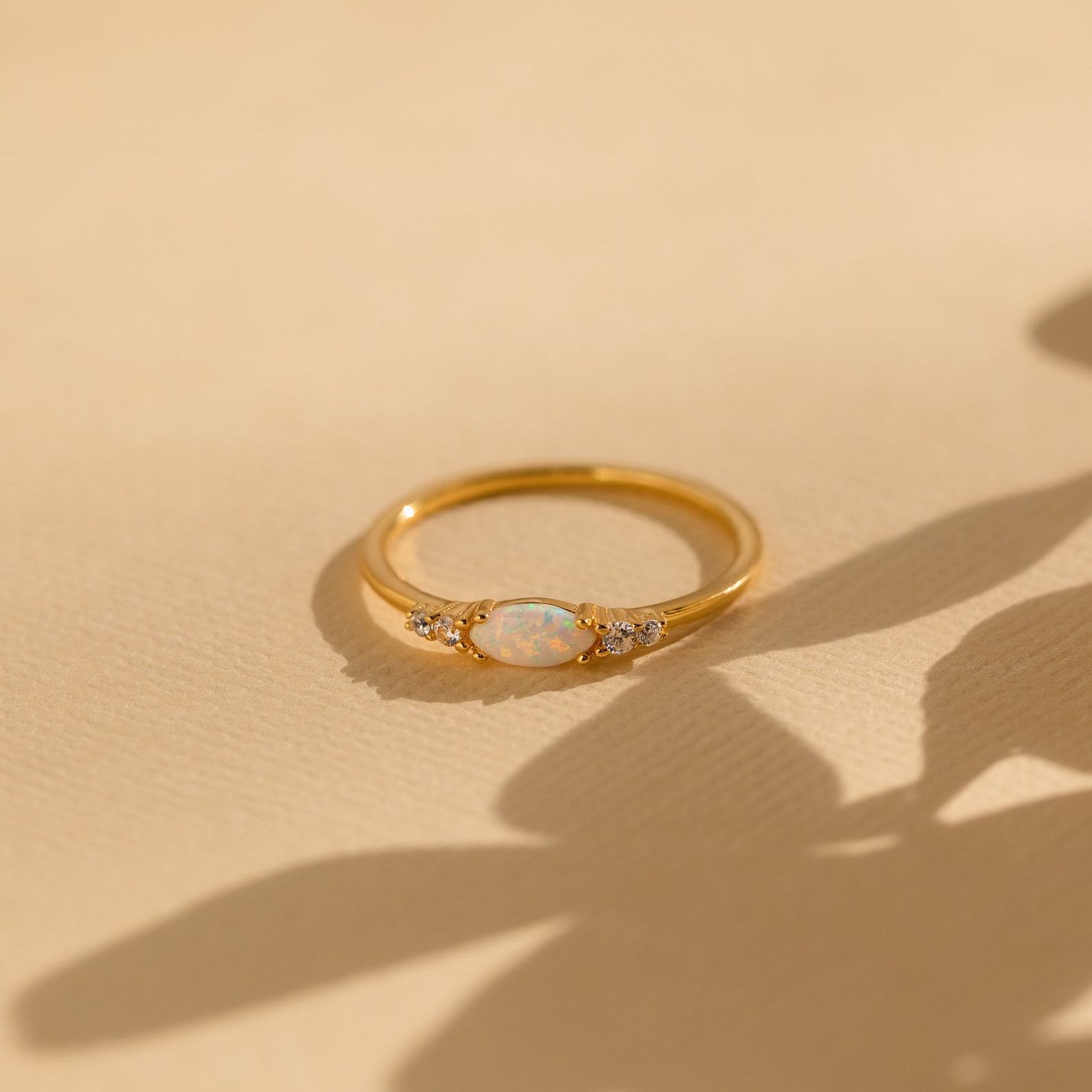 Sparkling Elegance Caitlyn’s Opal and Diamond Ring – A Timeless Symbol of Love