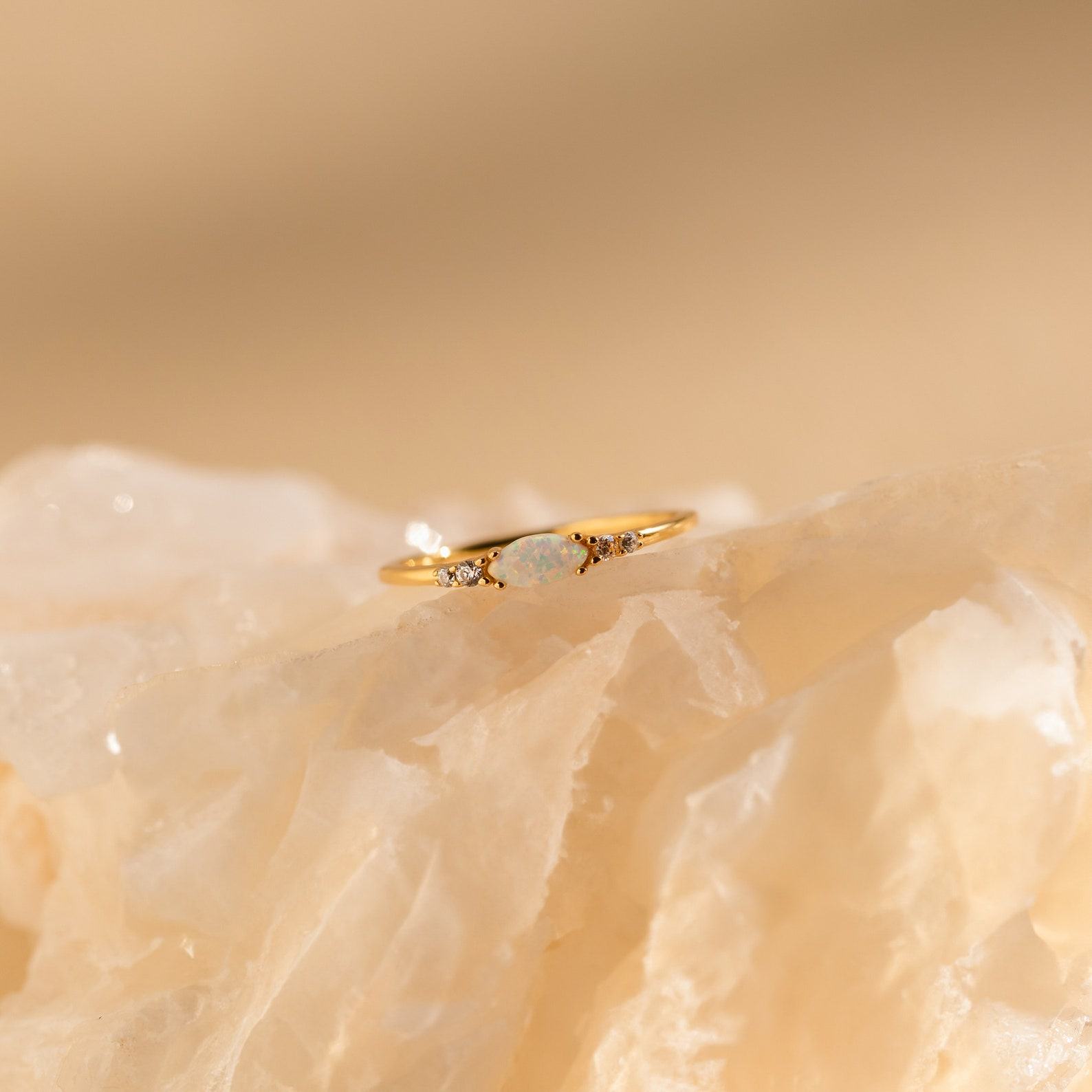 Sparkling Elegance Caitlyn’s Opal and Diamond Ring – A Timeless Symbol of Love