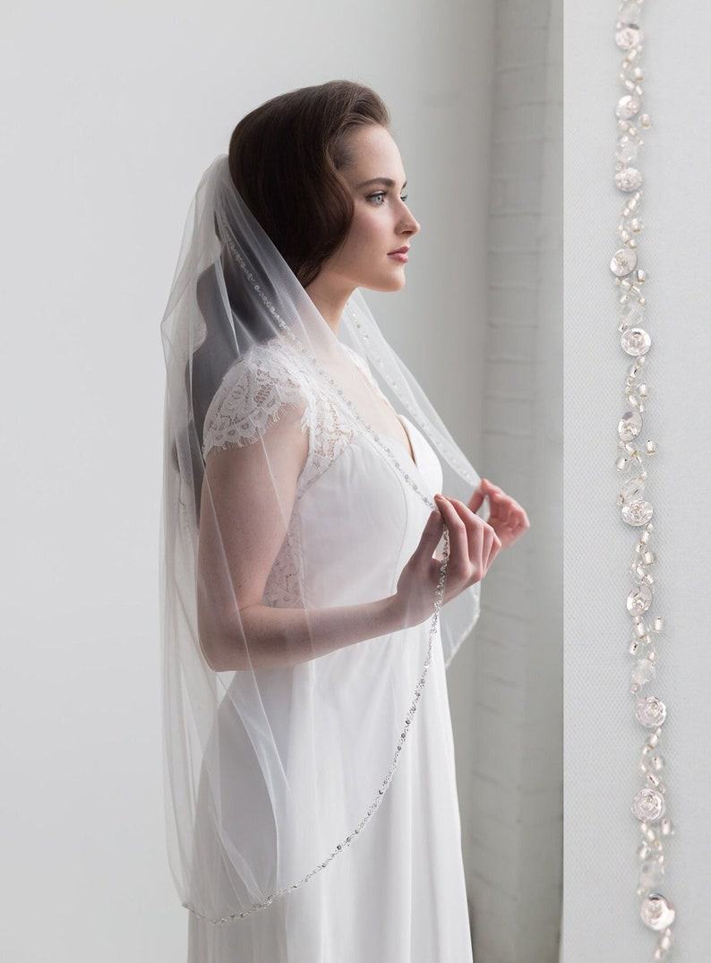 Sparkling Elegance Crystal-Embellished Wedding Veils for a Shimmering Bridal Look