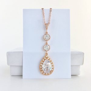 Sparkling Elegance Elongated Rose Gold Crystal Earrings for Bridal and Bridesmaid Adornment