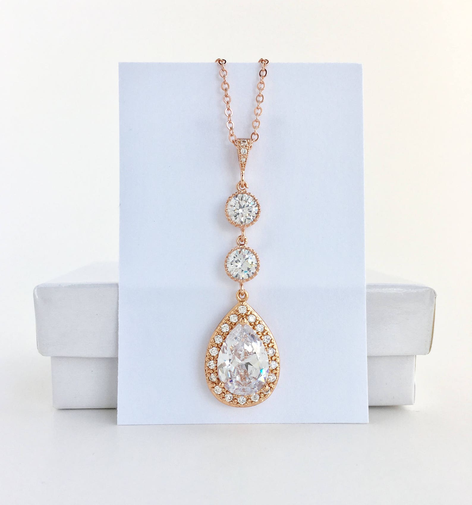 Sparkling Elegance Elongated Rose Gold Crystal Earrings for Bridal and Bridesmaid Adornment - Image 4