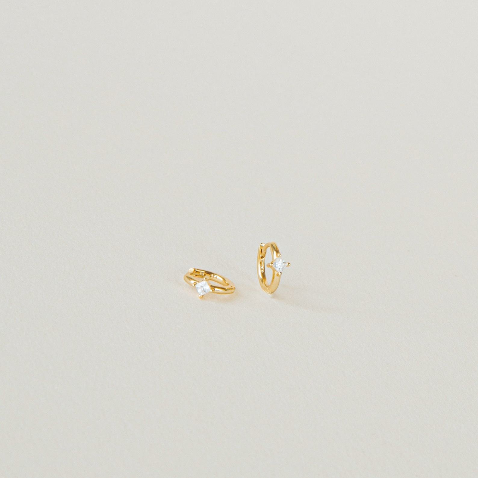 Sparkling Embrace Caitlyn’s Minimalist Diamond Huggie Earrings