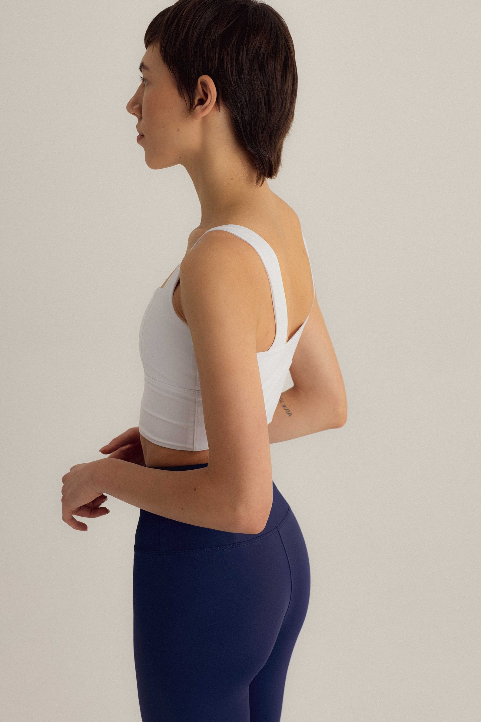 Sustainable Style Elevate Your Workouts with Our White ECONYL Crop Top and Bra - Image 3