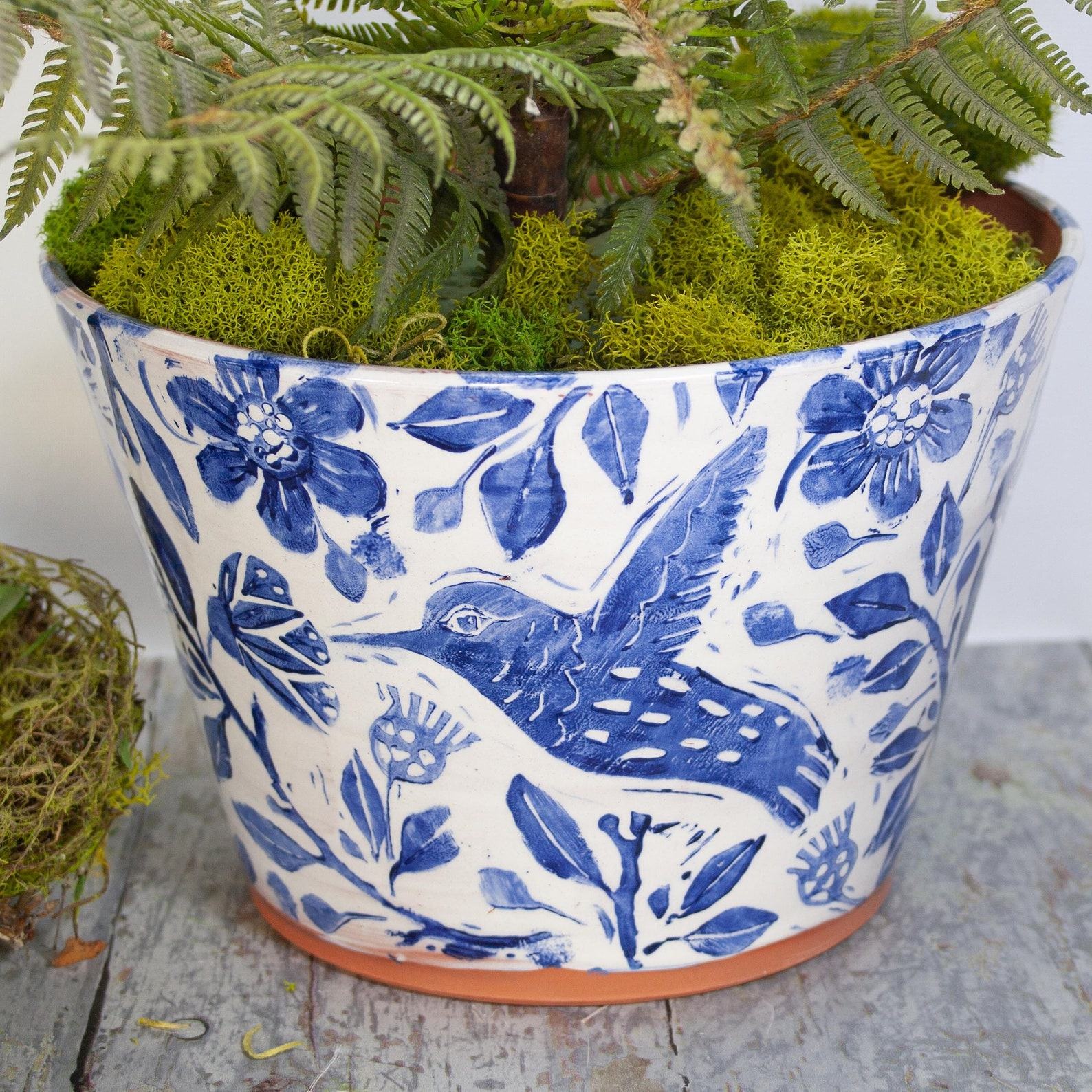 Terra Cotta Hummingbird Haven Handmade Planter with Blue and White Charm
