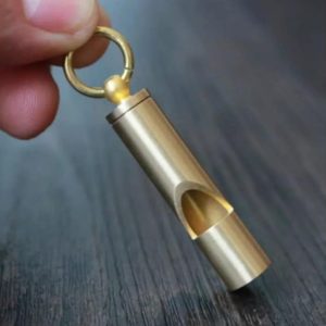 The Ultimate Survival Whistle Earsplitting Brass, Unwavering Reliability, Lifetime Guarantee