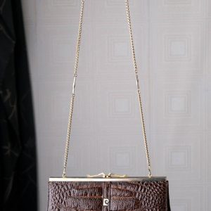 Timeless Treasure Vintage 1970s Pierre Cardin Embossed Leather Shoulder Bag with Golden Embrace