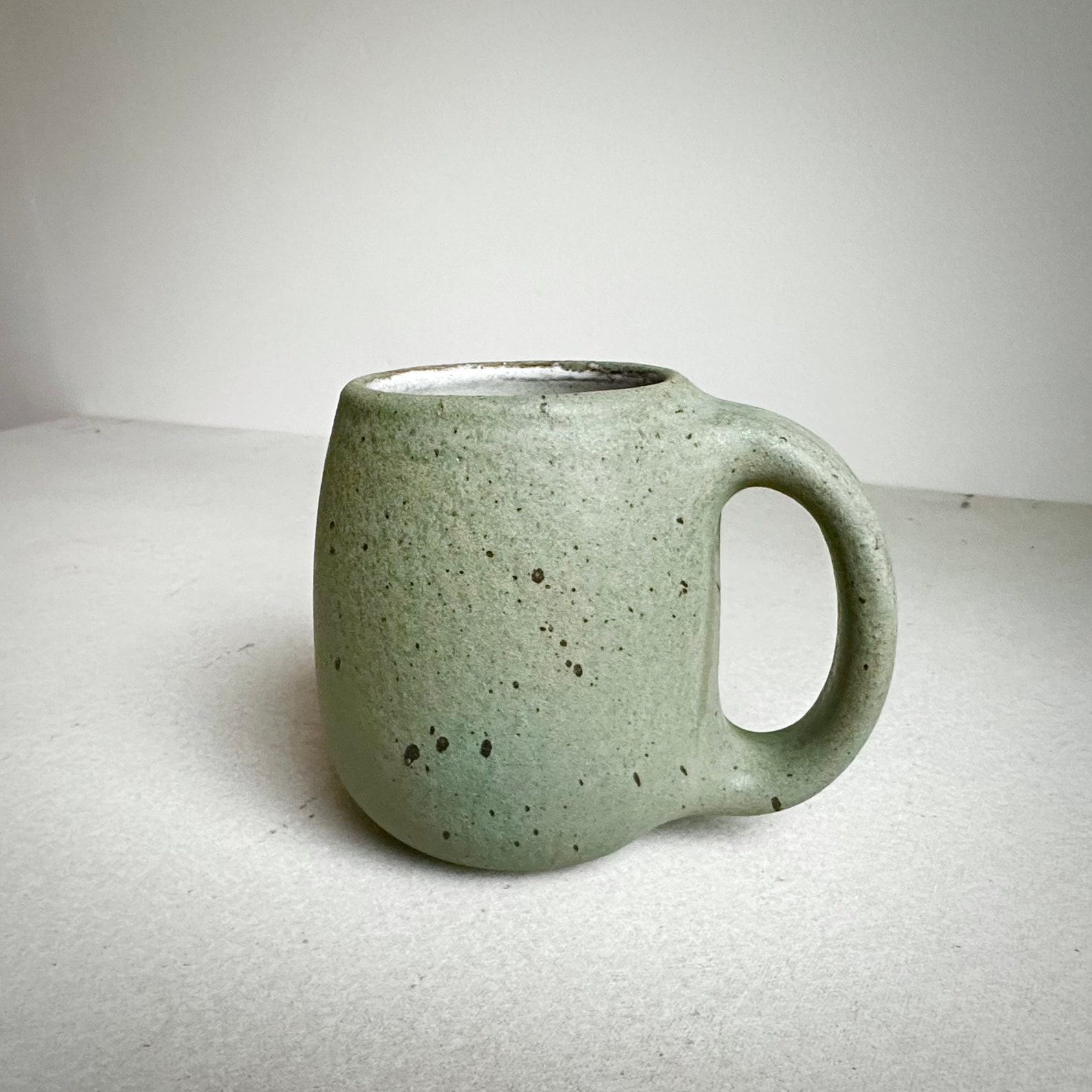 Timeless Treasures Handcrafted Aged Green Ceramic Mug for Your Daily Ritual