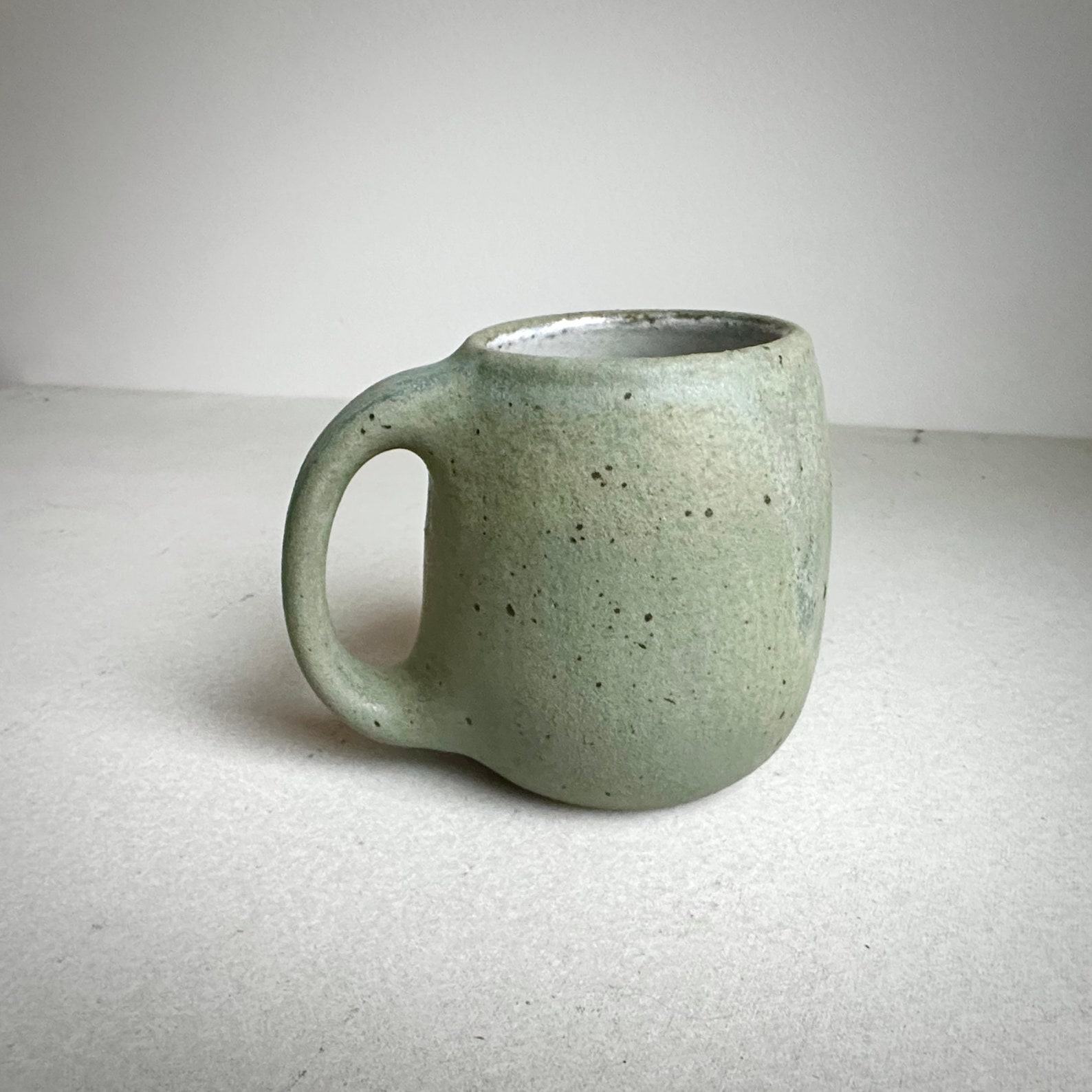 Timeless Treasures Handcrafted Aged Green Ceramic Mug for Your Daily Ritual