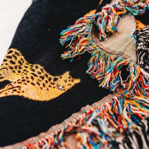 Unleash the Untamed Elegance Luxurious Leopard Throw for a Wildly Chic Home