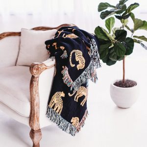 Unleash the Untamed Elegance Luxurious Leopard Throw for a Wildly Chic Home