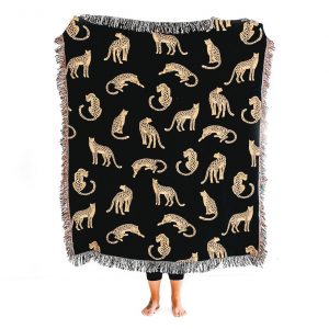 Unleash the Untamed Elegance Luxurious Leopard Throw for a Wildly Chic Home