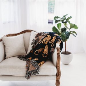 Unleash the Untamed Elegance Luxurious Leopard Throw for a Wildly Chic Home