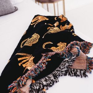 Unleash the Untamed Elegance Luxurious Leopard Throw for a Wildly Chic Home