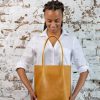 Versatile Leather Tote Your Everyday Companion in Brown and Mustard