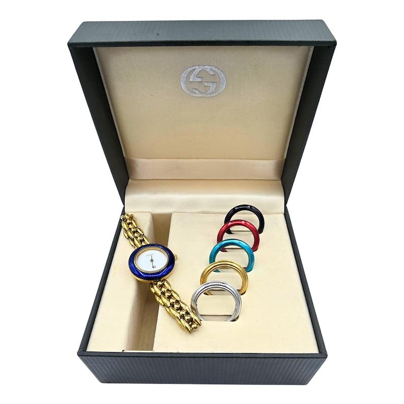 Vintage Gucci Interchangeable Bezel Gold Plated Ladies Dress Watch 1200L with Rice Link Bracelet Timeless Elegance for the Modern Woman