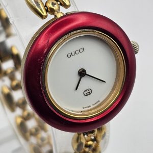 Vintage Gucci Interchangeable Bezel Watch with Rice Links Bracelet in Gold Tone A Timeless Treasure from the 90s