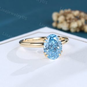 Vintage Oval Cut Lab Blue Diamond Solitaire Engagement Ring in Yellow Gold