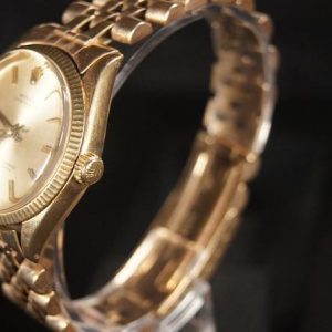 Vintage Rolex Oyster Perpetual A Timeless Treasure in 14K Gold (Circa 1965)
