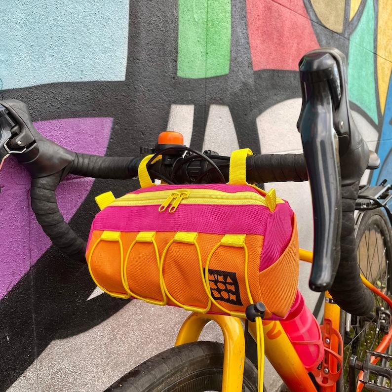 Vivid Hues on the Go Round Bike Handlebar Bag for Cyclists and Adventure Seekers
