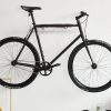 Wall-Mounted Bike Rack Elevate Your Ride with Bonnes Intentions’ White Metal Holder