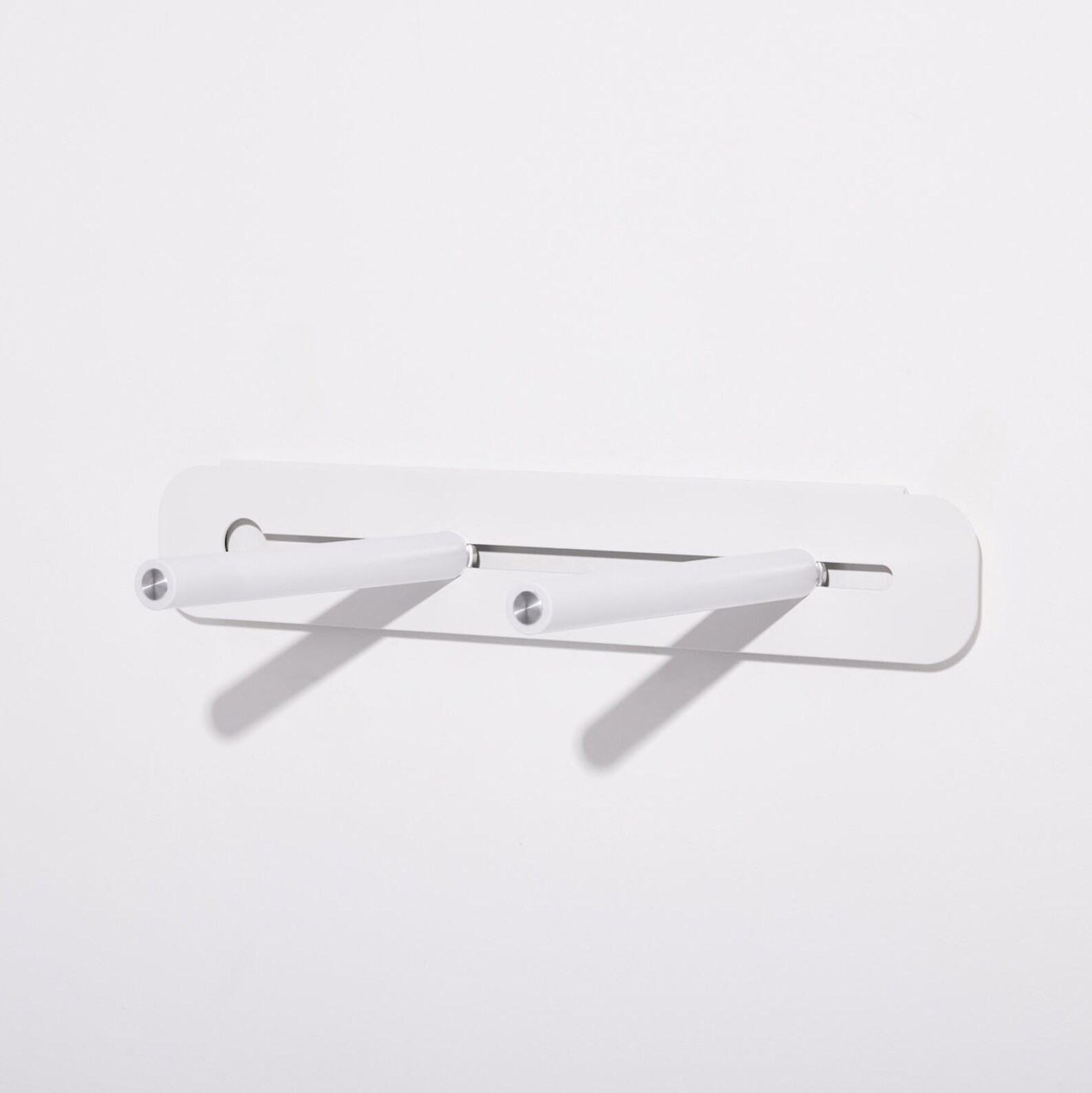 Wall-Mounted Bike Rack Elevate Your Ride with Bonnes Intentions’ White Metal Holder