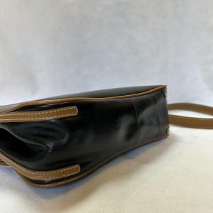 Yves Saint Laurent Black and Brown Leather Crossbody Bag A Timeless Accessory for the Modern Woman